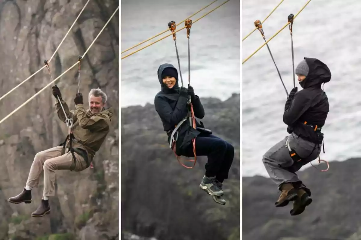 Federico, Mary y Josefina de Dinamarca con ropa abrigada disfrutan de una tirolesa sobre un paisaje rocoso junto al mar Federico, Mary y Josefina de Dinamarca con ropa abrigada disfrutan de una tirolesa sobre un paisaje rocoso junto al mar