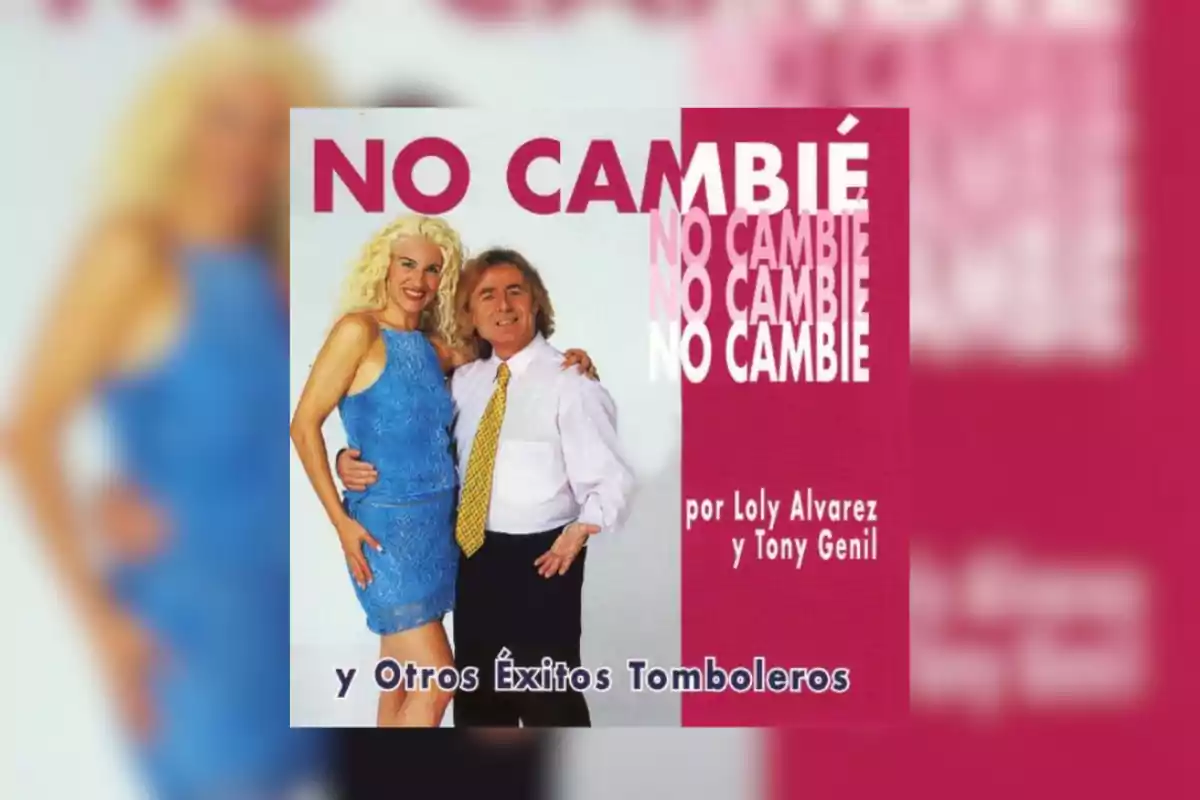 Portada de un disco titulado No Cambié con una mujer rubia de vestido azul y un hombre de camisa blanca y corbata amarilla posando juntos y sonriendo Portada de un disco titulado No Cambié con una mujer rubia de vestido azul y un hombre de camisa blanca y corbata amarilla posando juntos y sonriendo