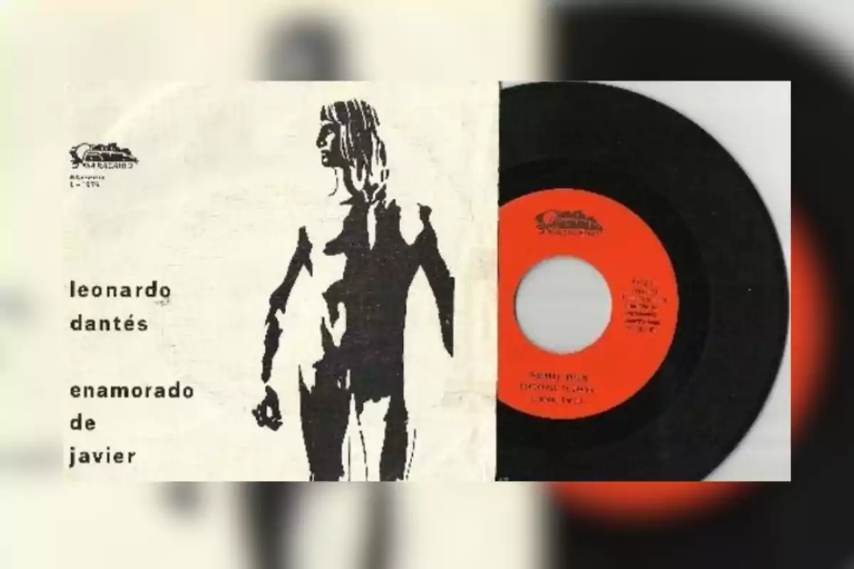 Portada de un disco de vinilo con una ilustración en blanco y negro de una figura humana y el texto leonardo dantés enamorado de javier junto a un vinilo con etiqueta roja Portada de un disco de vinilo con una ilustración en blanco y negro de una figura humana y el texto leonardo dantés enamorado de javier junto a un vinilo con etiqueta roja