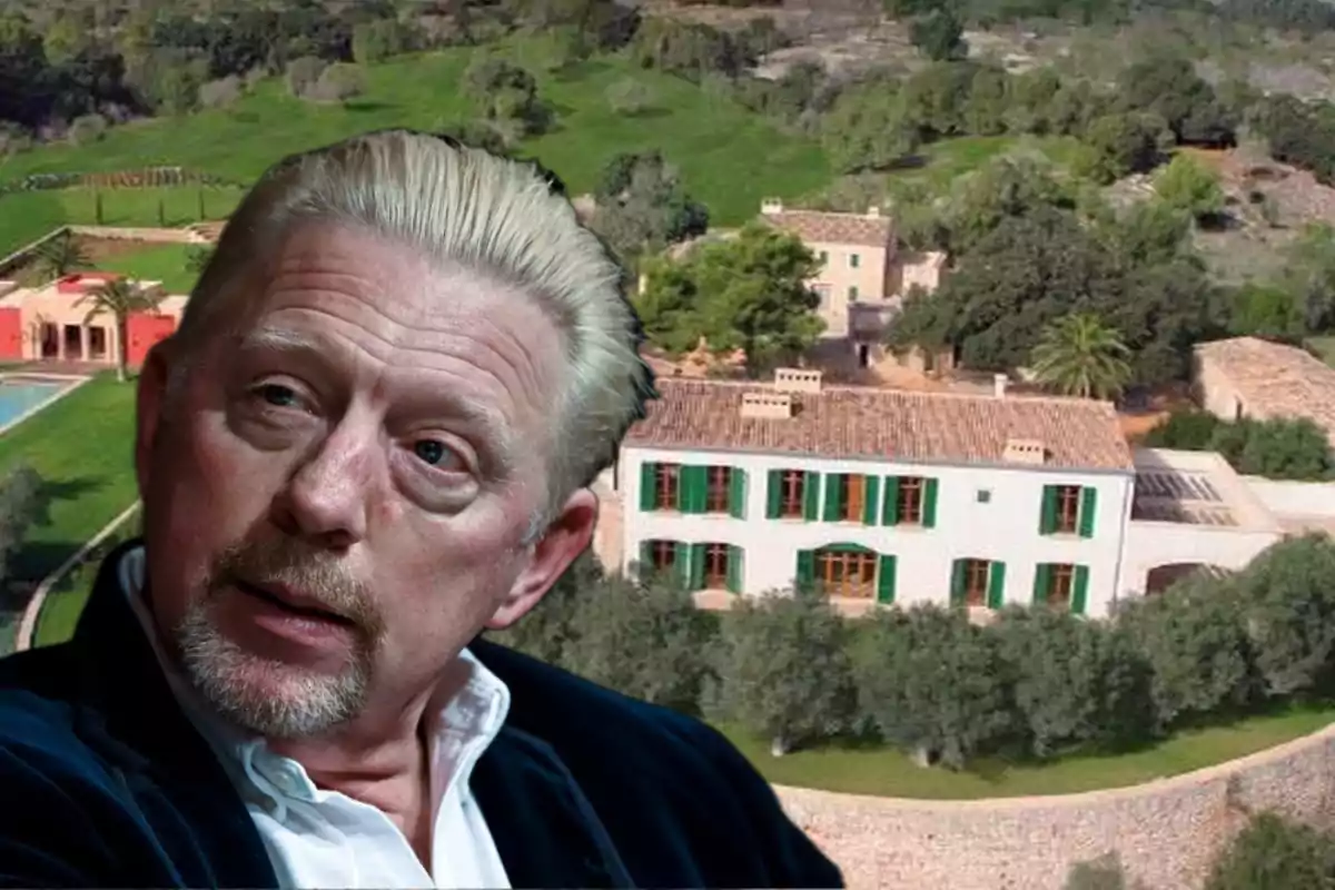 Hombre de cabello rubio y barba clara en primer plano con una gran casa de campo y jardines verdes al fondo Hombre de cabello rubio y barba clara en primer plano con una gran casa de campo y jardines verdes al fondo