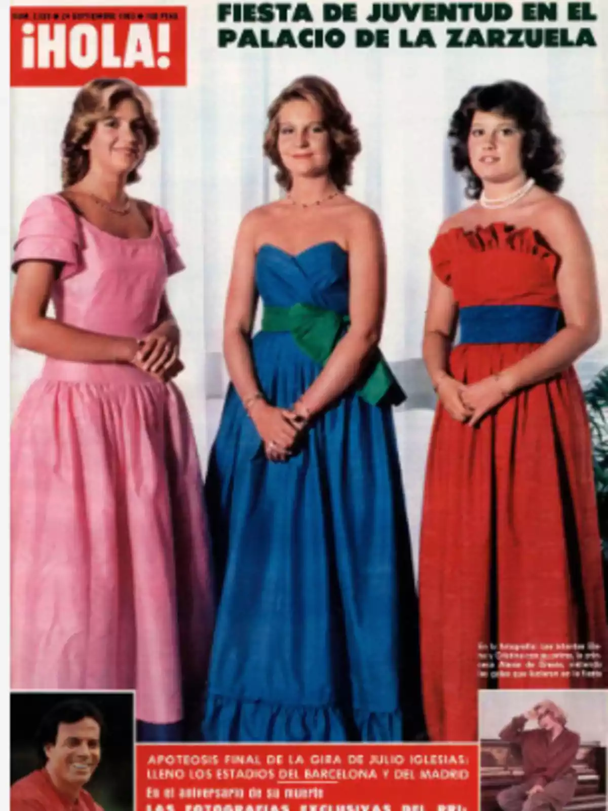 Portada de la revista ¡HOLA! con tres jóvenes vestidas con vestidos largos de colores rosa, azul y rojo, posando juntas en un evento en el Palacio de la Zarzuela Portada de la revista ¡HOLA! con tres jóvenes vestidas con vestidos largos de colores rosa, azul y rojo, posando juntas en un evento en el Palacio de la Zarzuela