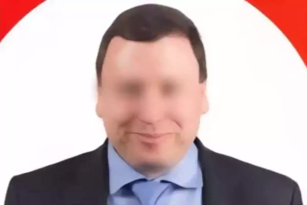 Hombre con rostro difuminado vistiendo traje y corbata azul sobre fondo blanco con detalles rojos Hombre con rostro difuminado vistiendo traje y corbata azul sobre fondo blanco con detalles rojos