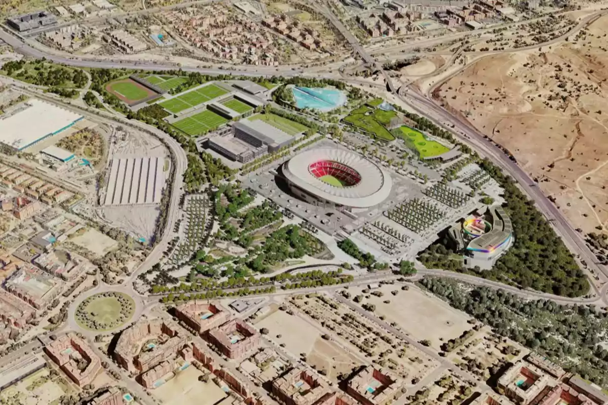 Vista aérea de un complejo deportivo moderno con un estadio principal rodeado de áreas verdes, canchas de entrenamiento, edificios auxiliares y zonas urbanas a su alrededor Vista aérea de un complejo deportivo moderno con un estadio principal rodeado de áreas verdes, canchas de entrenamiento, edificios auxiliares y zonas urbanas a su alrededor