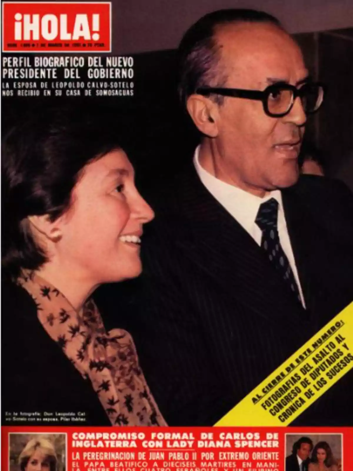 Portada de la revista ¡HOLA! de marzo de 1981 con una fotografía de un hombre con gafas y una mujer sonriendo, ambos elegantemente vestidos Portada de la revista ¡HOLA! de marzo de 1981 con una fotografía de un hombre con gafas y una mujer sonriendo, ambos elegantemente vestidos