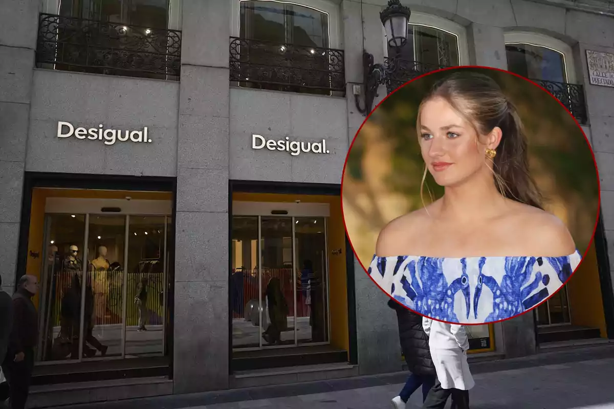 Fachada de una tienda Desigual con un círculo que muestra a una joven de cabello castaño claro recogido, usando un vestido azul y blanco con los hombros descubiertos.