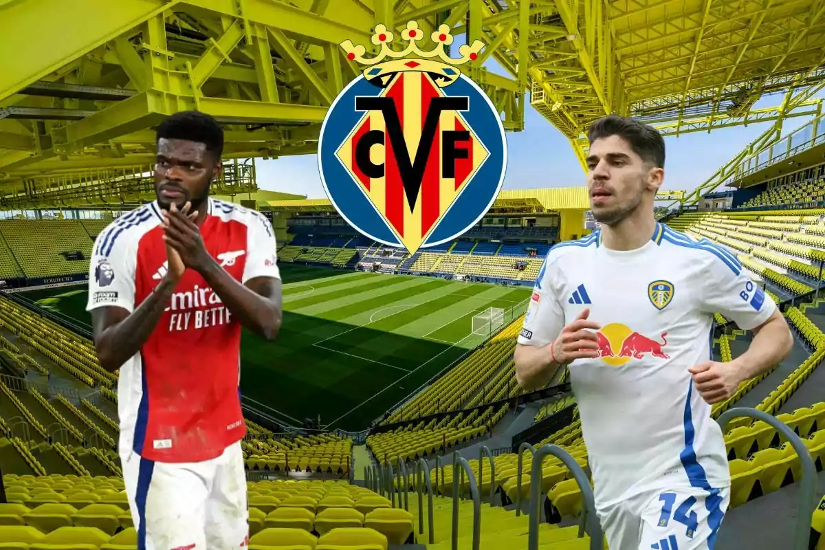 Dos futbolistas con uniformes de diferentes equipos frente al escudo del Villarreal en un estadio de fútbol amarillo y vacío