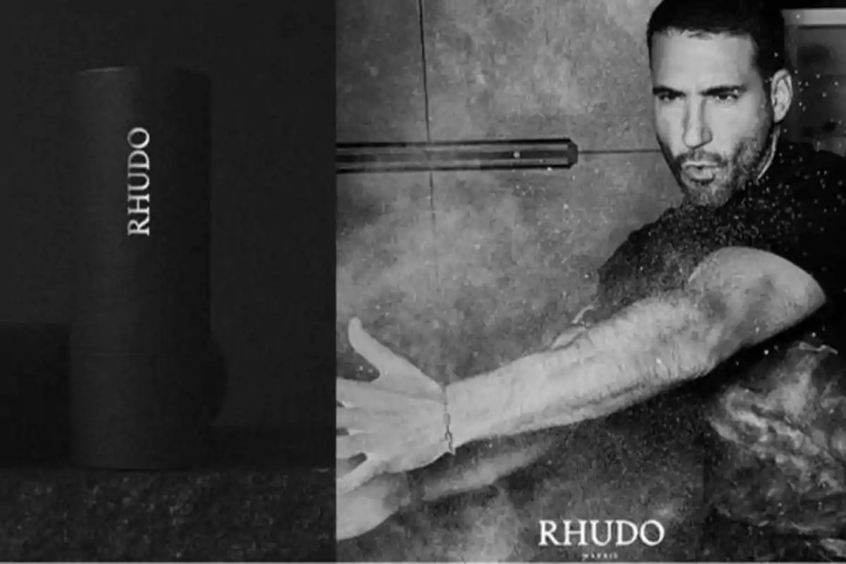 Imagen en blanco y negro de un hombre lanzando polvo con las manos y un envase cilíndrico con la palabra "RHUDO".
