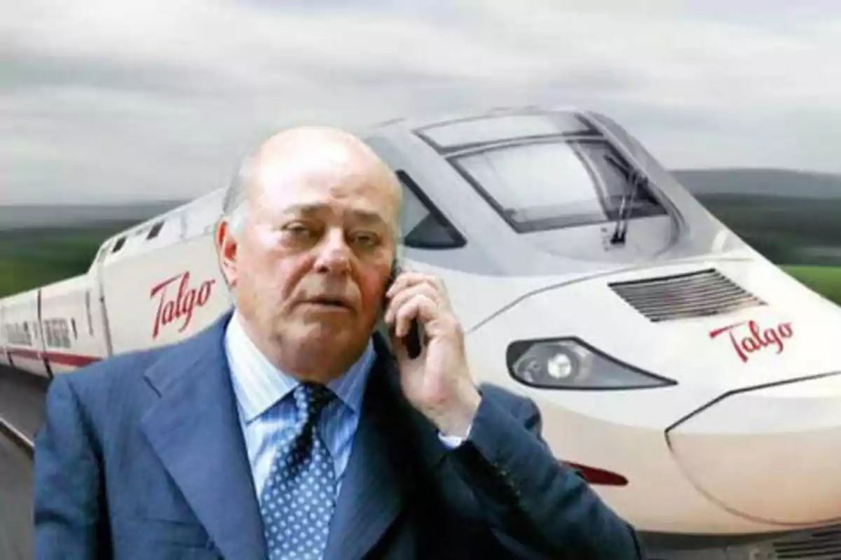 Hombre hablando por teléfono frente a un tren de alta velocidad Talgo.