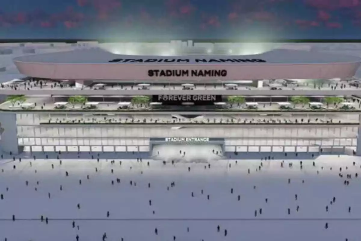 Imagen de un estadio moderno con múltiples niveles, áreas verdes y una entrada principal iluminada, con personas caminando en la explanada frente al estadio.
