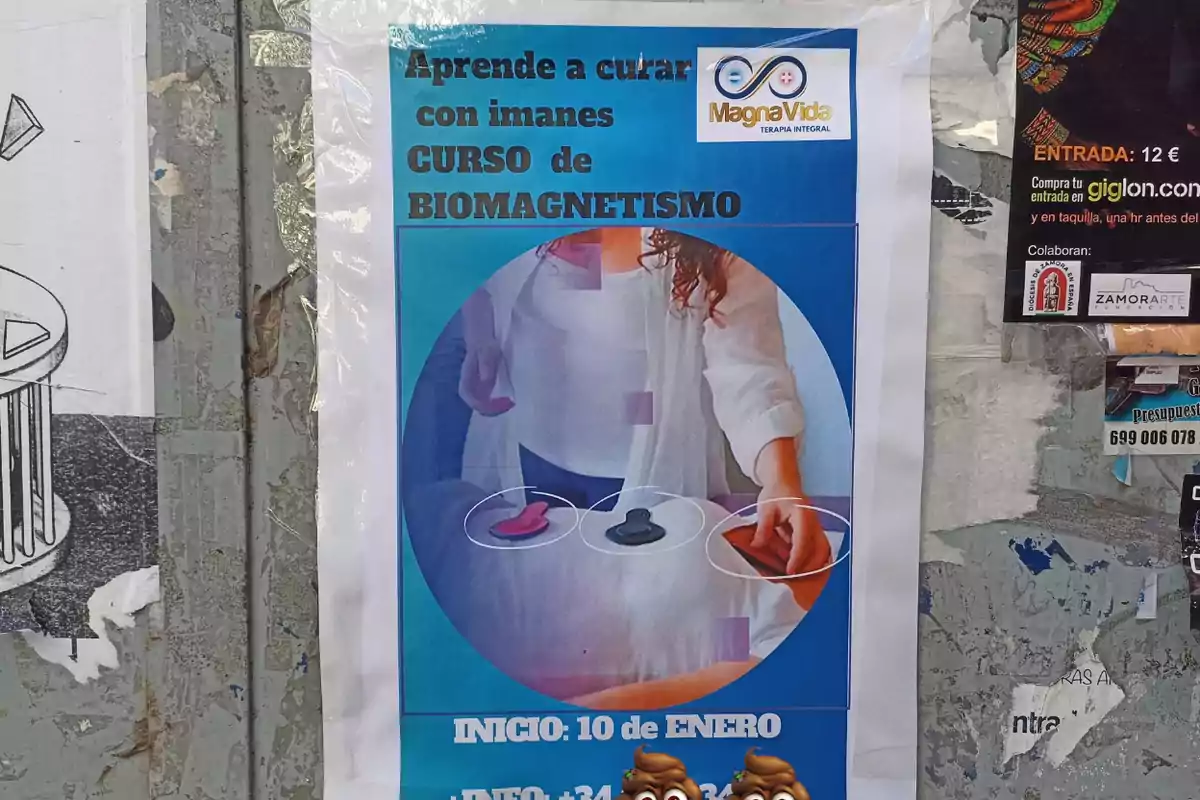 Un cartel promociona un curso de biomagnetismo, destacando el uso de imanes para curar, con inicio el 10 de enero y un número de contacto para más información.