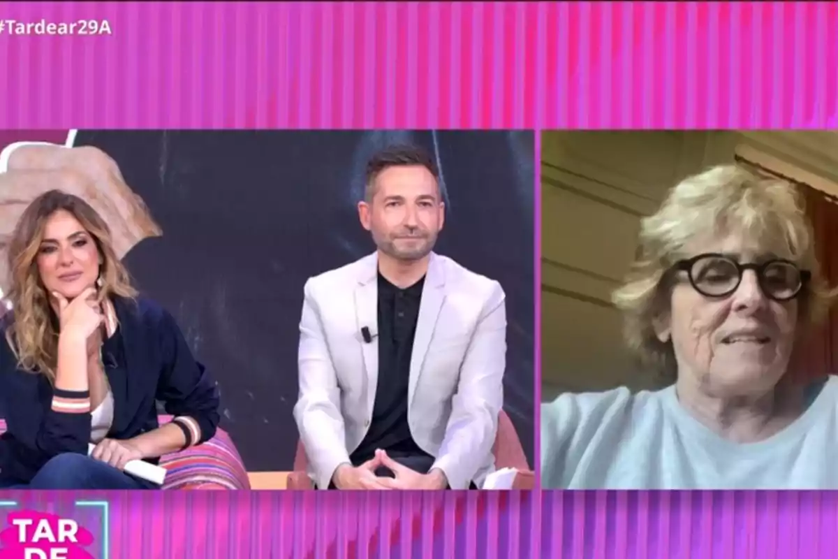 Verónica Dulanto, Frank Blanco y Mercedes Milá participando en un programa de televisión con un fondo de rayas rosas y una videollamada en pantalla. Verónica Dulanto, Frank Blanco y Mercedes Milá participando en un programa de televisión con un fondo de rayas rosas y una videollamada en pantalla.