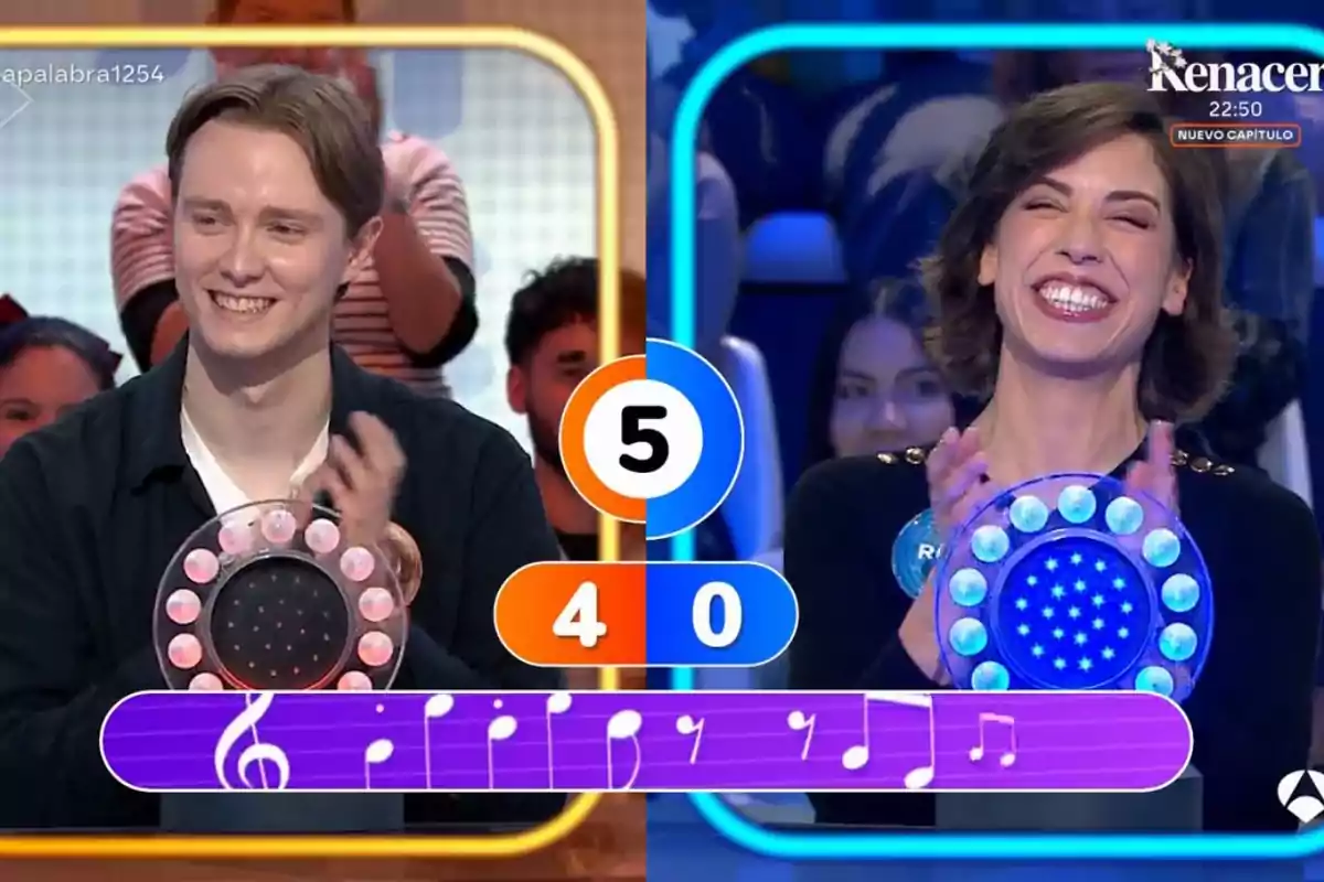 Manu y Rosa sonríen y aplauden en un programa de televisión mientras el marcador muestra un puntaje de 4 a 0 y una cuenta regresiva en el centro. Manu y Rosa sonríen y aplauden en un programa de televisión mientras el marcador muestra un puntaje de 4 a 0 y una cuenta regresiva en el centro.