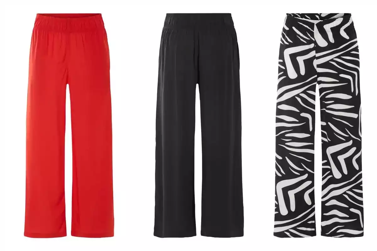 Tres pantalones de mujer de pierna ancha de Lidl en diferentes estilos: uno rojo, uno negro y uno con estampado blanco y negro. Tres pantalones de mujer de pierna ancha de Lidl en diferentes estilos: uno rojo, uno negro y uno con estampado blanco y negro.