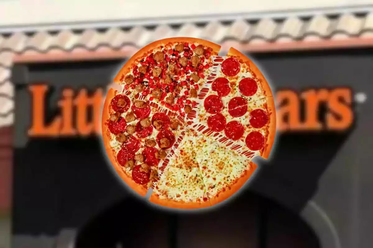 Pizza con diferentes ingredientes flotando frente a una pizzería con letrero desenfocado Pizza con diferentes ingredientes flotando frente a una pizzería con letrero desenfocado