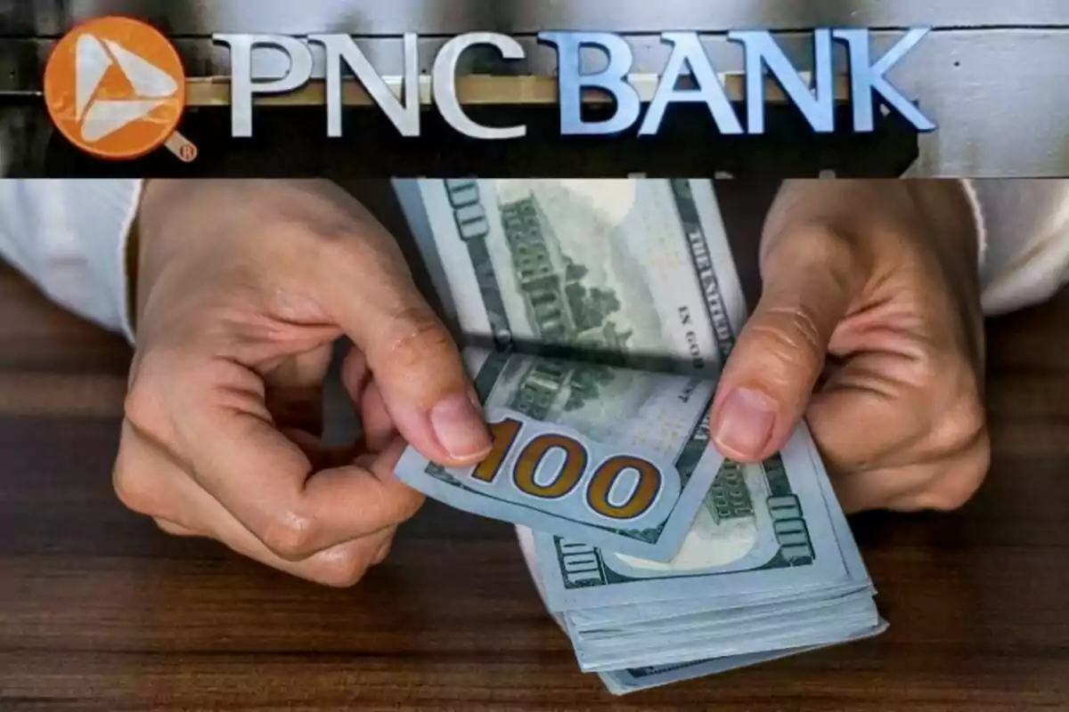 Un letrero de un banco y manos contando billetes de cien dólares.