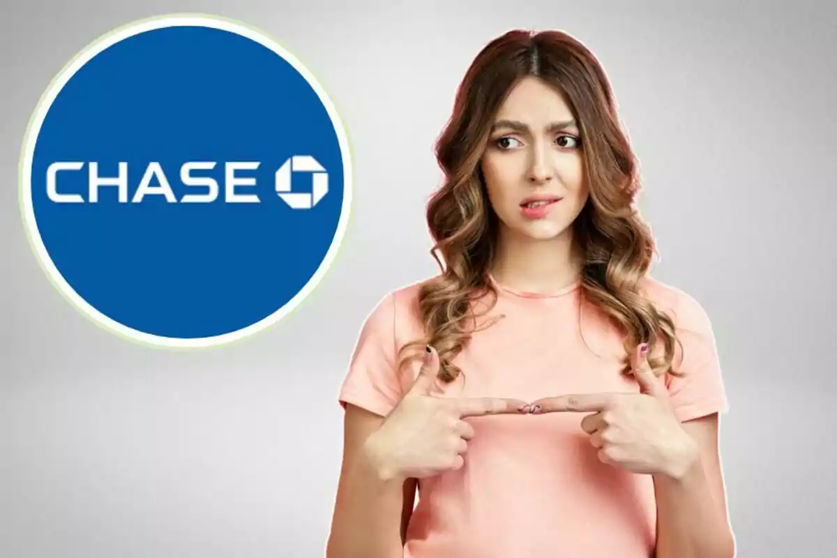 Woman with a confused expression pointing at a blue Chase logo.