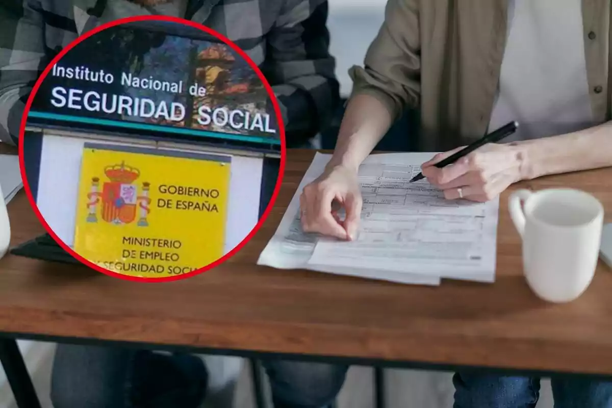 Dos personas revisan documentos en una mesa, con una taza de café al lado, y un recuadro muestra un cartel del Instituto Nacional de Seguridad Social del Gobierno de España.