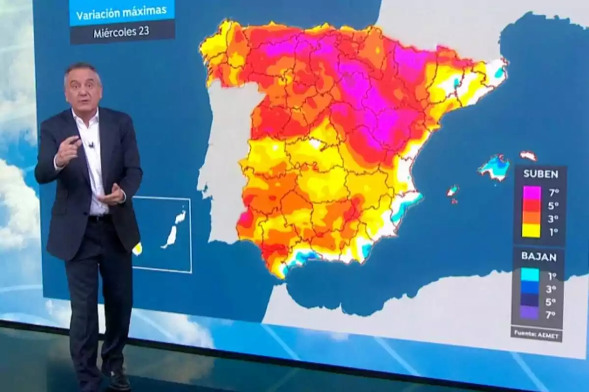 Roberto Brasero está de pie junto a un mapa de España que muestra variaciones de temperatura con colores que indican aumentos y disminuciones en diferentes regiones que pertenecen a la previsión del 23 de abril de 2025. Roberto Brasero está de pie junto a un mapa de España que muestra variaciones de temperatura con colores que indican aumentos y disminuciones en diferentes regiones que pertenecen a la previsión del 23 de abril de 2025.