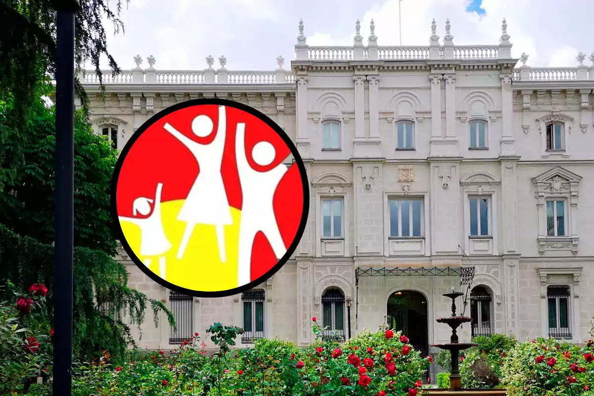 Un edificio histórico con un jardín lleno de rosas y un logotipo circular con figuras humanas estilizadas en el centro.