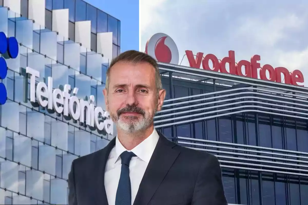 Un hombre de traje frente a los edificios de Telefónica y Vodafone