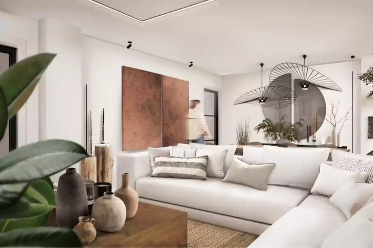 Sala de estar moderna con sofá blanco, decoración minimalista y plantas.