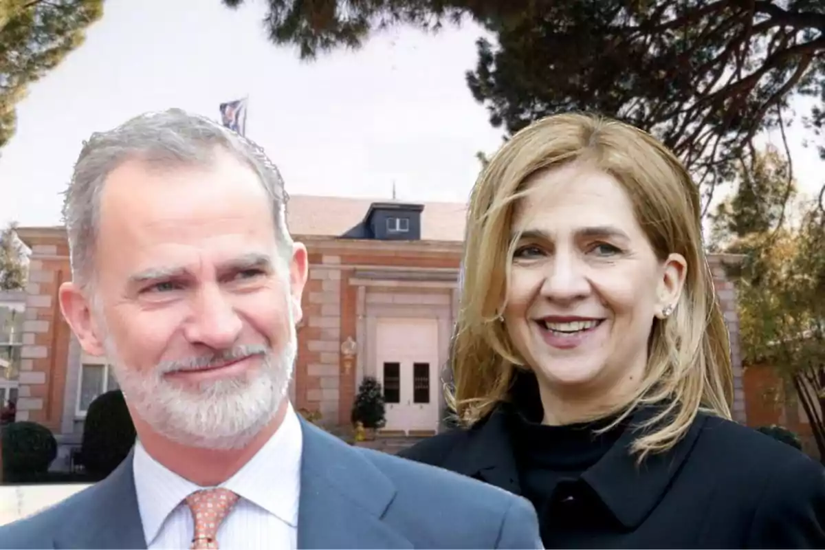 Dos personas sonrientes posando frente a un edificio.