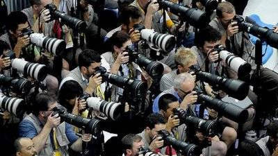 Fotógrafos profesionales de prensa.