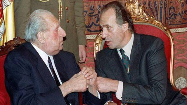 Don Juan de Borbón y Juan Carlos I.